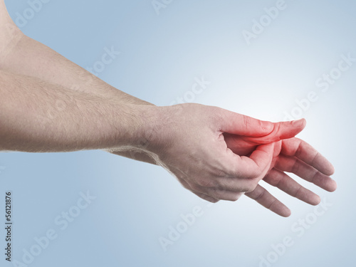 Photo: Pain in a man finger. Pain in a man finger.