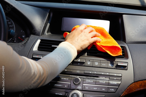 Photo: Hand cleaning car. Hand cleaning car.