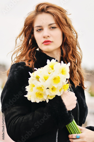Photo: tenn girl with daffodils tenn girl with daffodils