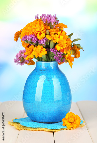 Photo: Bouquet of marigold flowers in vase Bouquet of marigold flowers in vase