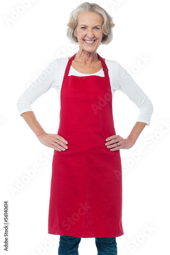 Photo: Cheerful aged confident female chef Cheerful aged confident female chef