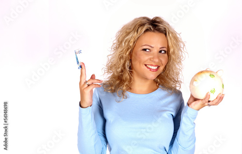 Photo: Frau mit Sparschwein und Geld Frau mit Sparschwein und Geld