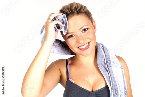 Photo: Junge Frau nach dem Fitnesstraining Junge Frau nach dem Fitnesstraining