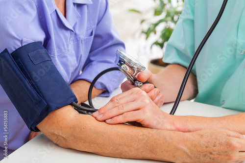 Photo: Doctor taking pulse Doctor taking pulse
