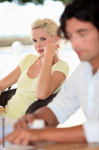 Photo: Man and woman at a cafe Man and woman at a cafe