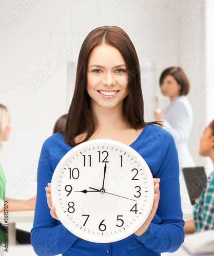 Photo: student showing clock student showing clock