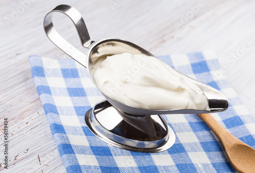 Photo: Dairy products - sour cream. Dairy products - sour cream.