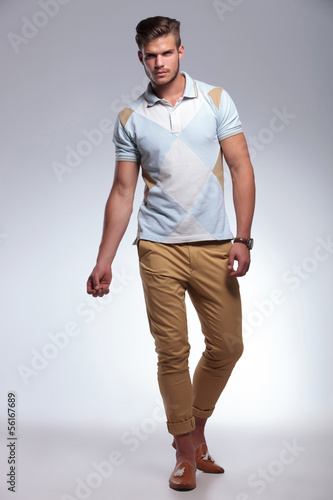 Photo: casual man walking toward the camera casual man walking toward the camera