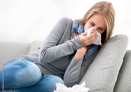 Photo: young woman having a cold young woman having a cold