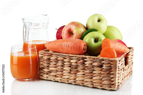 Photo: Sweet apples, juice and carrots isolated on white Sweet apples, juice and carrots isolated on white