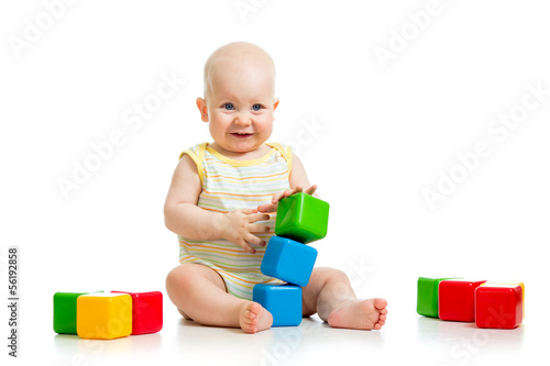Photo: little boy with tools and building blocks little boy with tools and building blocks