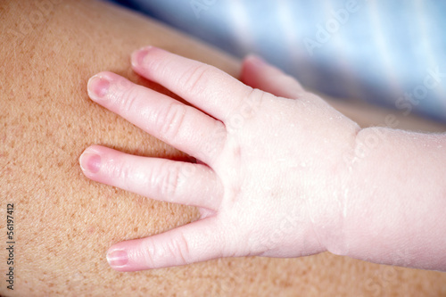 Photo: Hand von einem Baby Hand von einem Baby