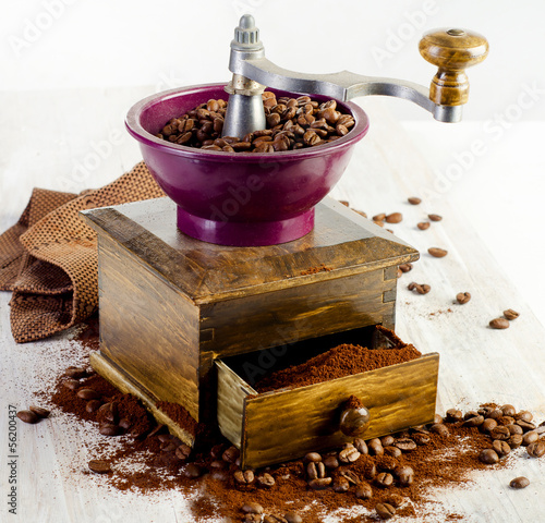 Photo: Coffee and old-fashioned coffee grinder Coffee and old-fashioned coffee grinder