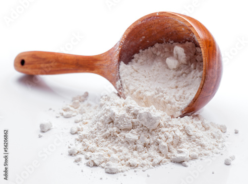 Photo: classic wooden dipper with flour classic wooden dipper with flour