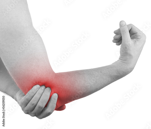 Photo: Pain in a man elbow. Pain in a man elbow.