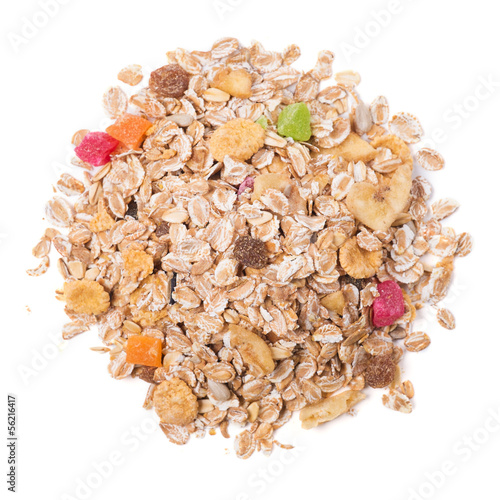 Photo: pile of muesli isolated on white background pile of muesli isolated on white background