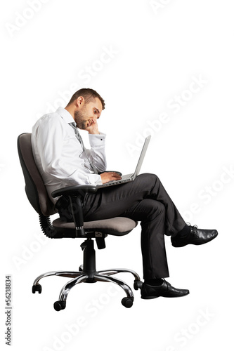 Photo: tired businessman sitting on office chair tired businessman sitting on office chair