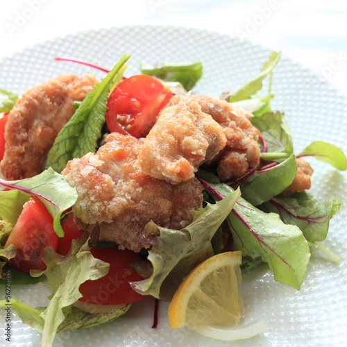 Photo: fried chicken with baby leaf salad fried chicken with baby leaf salad
