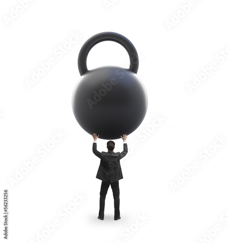 Photo: man holding weight man holding weight