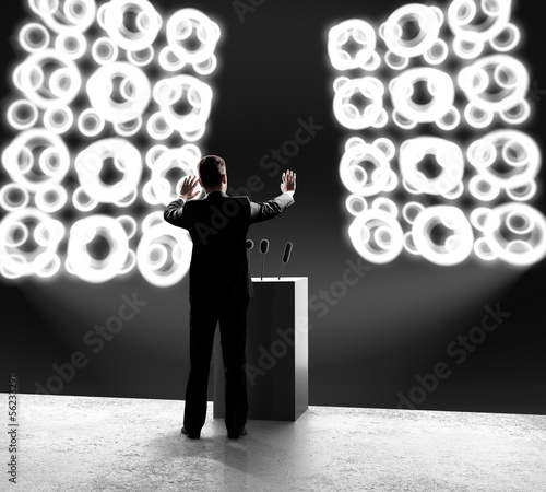 Photo: businessman standing on stage businessman standing on stage