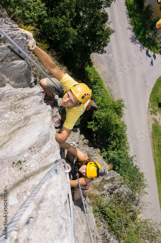 Photo: Man And Woman Climbing Rock Man And Woman Climbing Rock