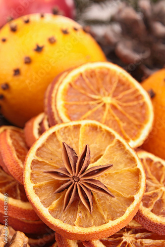 Photo: close up on star anise and dried orange slices close up on star anise and dried orange slices