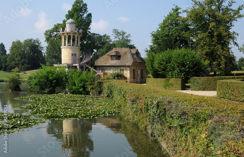 Photo: Queen Hamlet in the park of Versailles Palace Queen Hamlet in the park of Versailles Palace