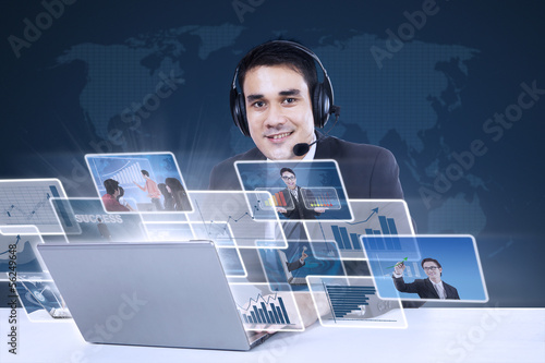 Photo: Customer service with internet online on blue Customer service with internet online on blue