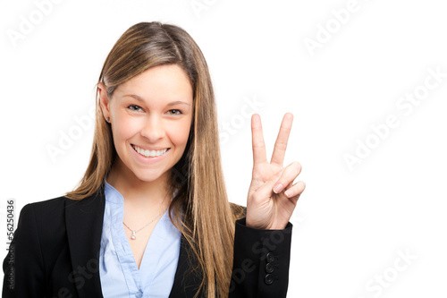 Photo: Businesswoman showing victory sign Businesswoman showing victory sign