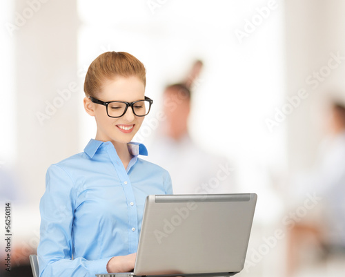 Photo: woman with laptop woman with laptop