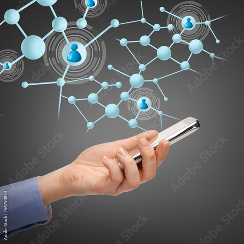 Photo: woman with smartphone and virtual contacts woman with smartphone and virtual contacts