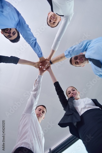Photo: business people group joining hands business people group joining hands