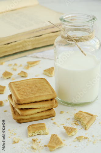Photo: Short pastry and bottle of milk Short pastry and bottle of milk