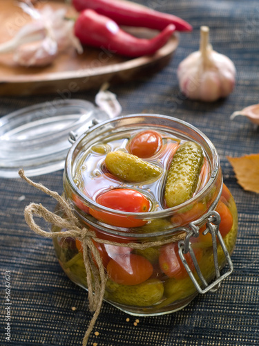 Photo: Preserved cucumber and tomato Preserved cucumber and tomato