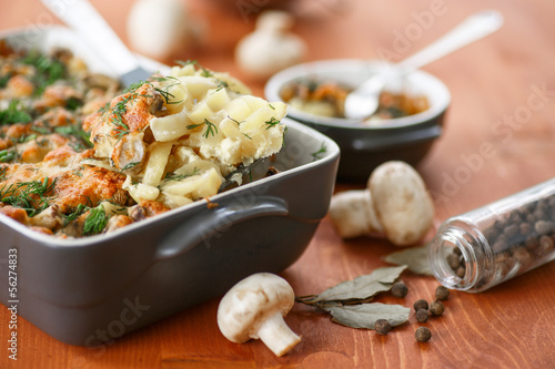 Photo: Baked potato with mushrooms and cheese Baked potato with mushrooms and cheese