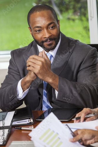 Photo: African American Businessman Man in Meeting African American Businessman Man in Meeting