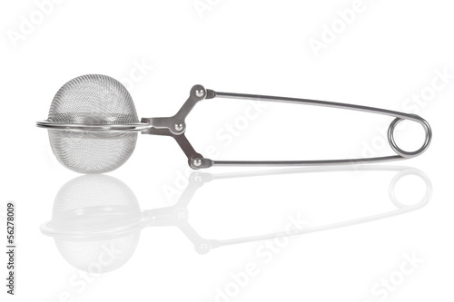 Photo: Tea infuser isolated on a white background Tea infuser isolated on a white background