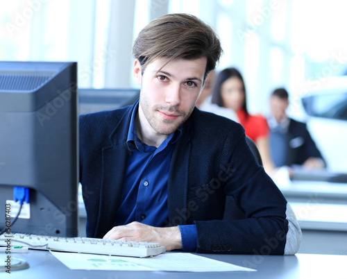 Photo: businessman using laptop businessman using laptop