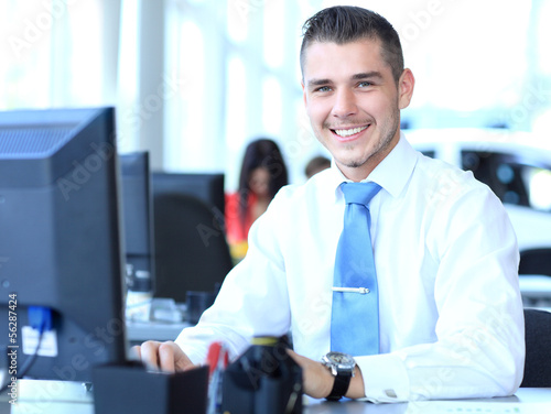 Photo: business man using laptop business man using laptop