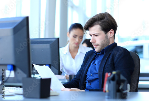 Photo: businessman using laptop businessman using laptop