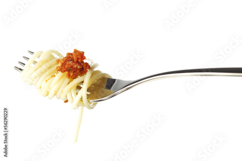 Photo: Pasta on fork isolated on white Pasta on fork isolated on white