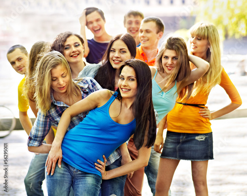 Photo: Group people in summer outdoor. Group people in summer outdoor.