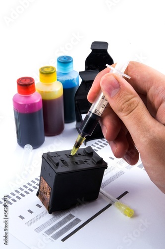 Photo: Injecting ink cartridge. Set of refill inkjet for print. Injecting ink cartridge. Set of refill inkjet for print.