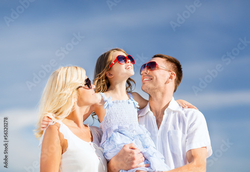 Photo: happy family with blue sky happy family with blue sky