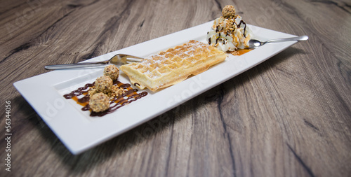 Photo: frische Waffel mit Pralinen und Sahne frische Waffel mit Pralinen und Sahne