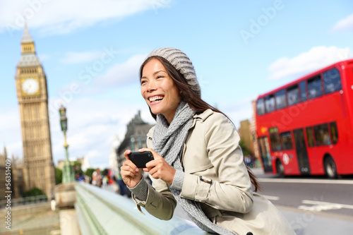 Photo: London tourist woman sightseeing taking pictures London tourist woman sightseeing taking pictures