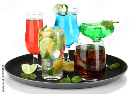 Photo: Many glasses of cocktails on tray, isolated on white Many glasses of cocktails on tray, isolated on white