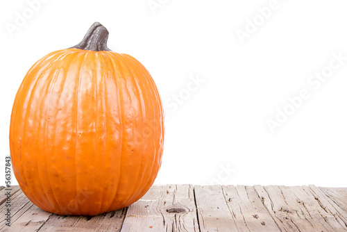 Photo: pumpkin on wooden plank pumpkin on wooden plank