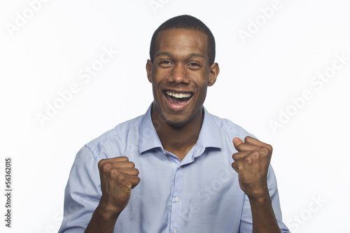 Photo: Young African-American man excited and cheering, horizontal Young African-American man excited and cheering, horizontal