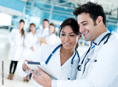 Photo: Couple of doctors talking Couple of doctors talking